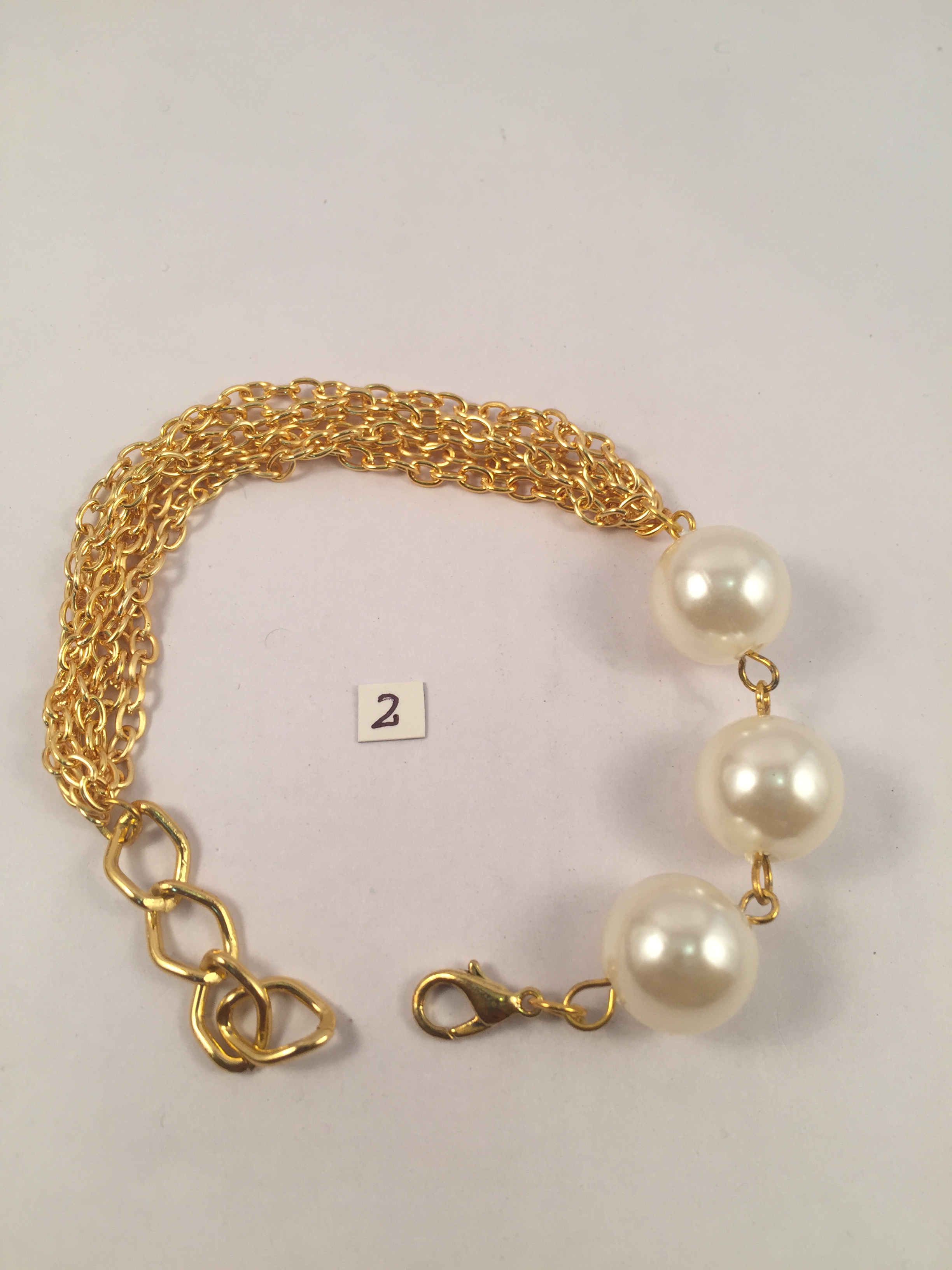 Chunky pearl gold toned chain bracelet