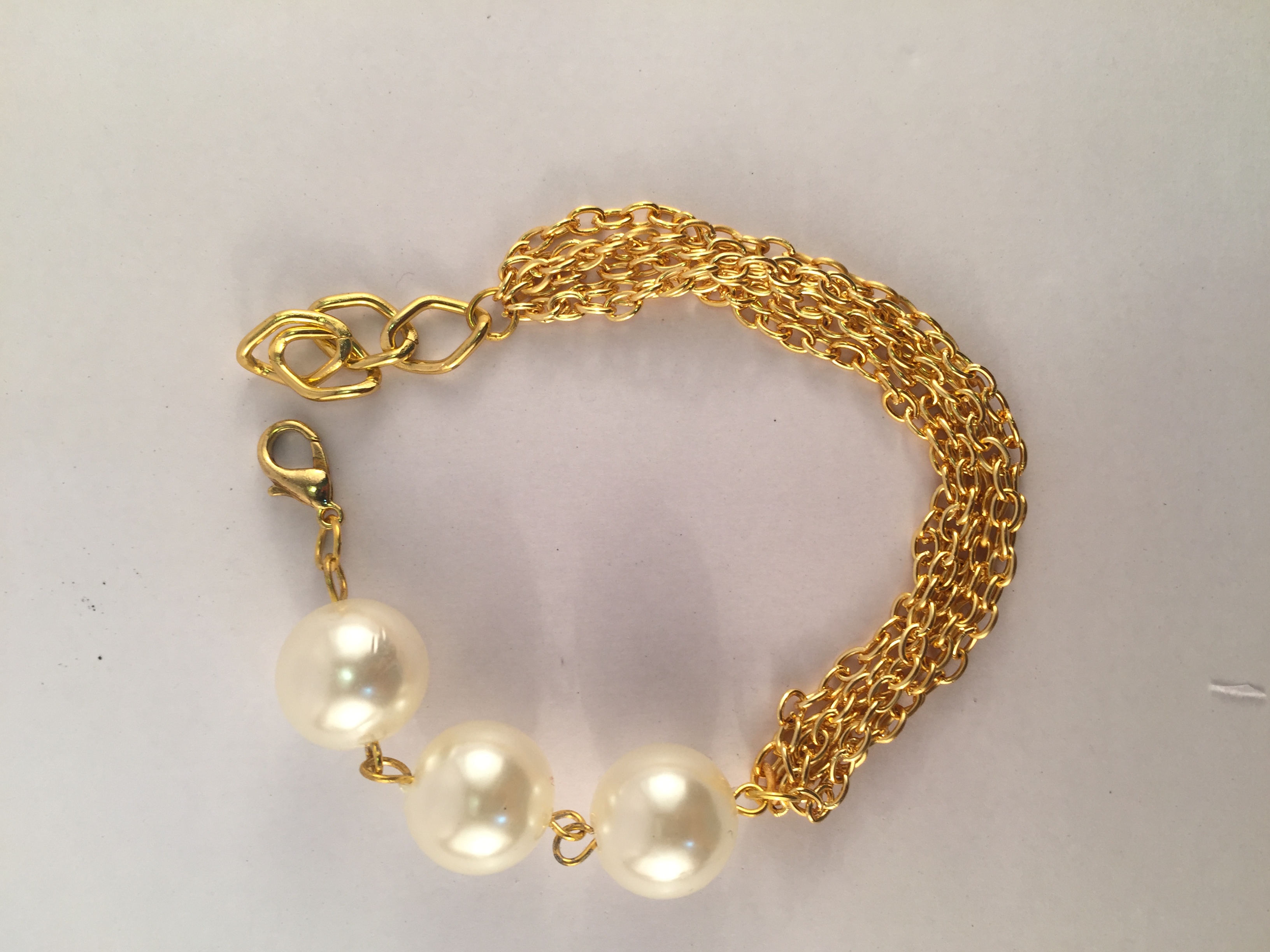 Multi chain bracelet with pearls