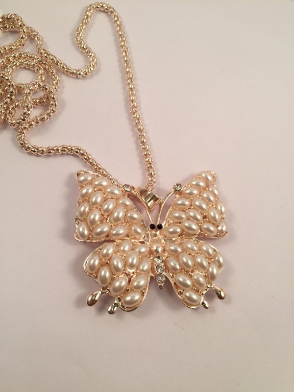 Galmorous and Stylish long chain with Butterfly pearl themed pendant