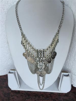 Bohemian Retro style chunky silver toned multi coined vintage necklace